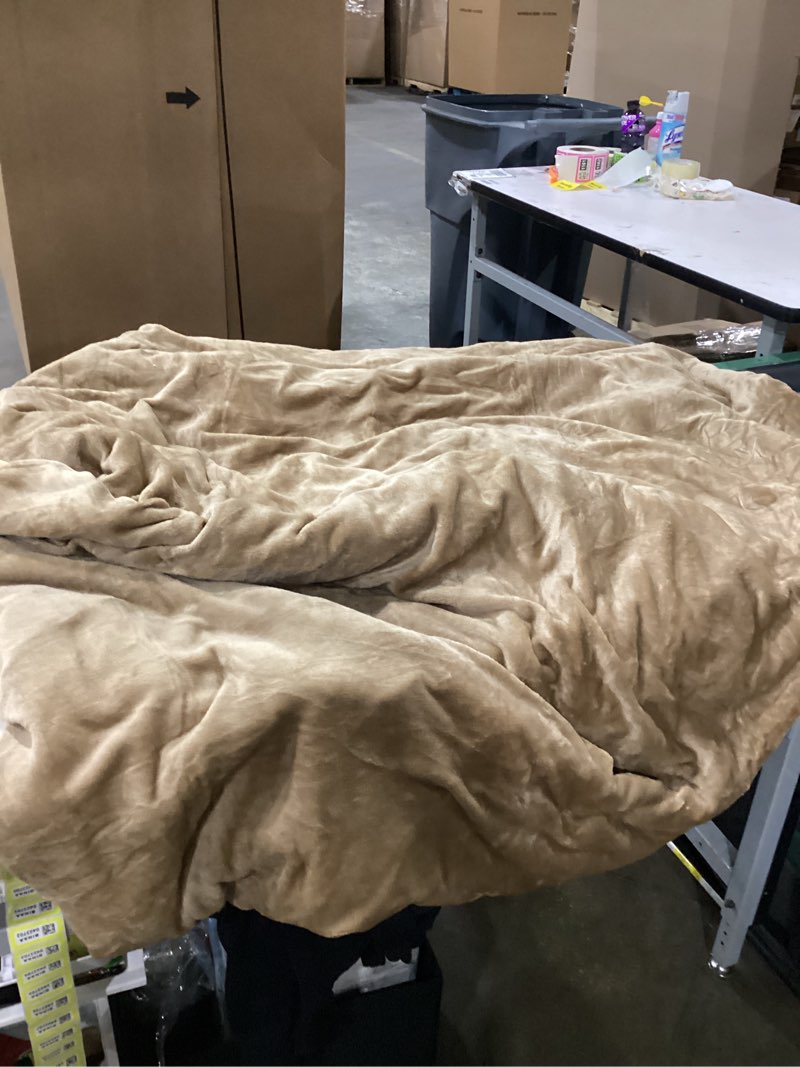 Condition photo showing As Is for Heated blanket unknown size