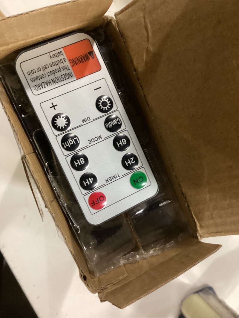 Condition photo showing As Is for GenSwin Flameless White Taper Candles Flickering with 10-Key Remote, Battery Operated Led Warm 3D Wick Light Window Candles Real Wax Pack of 6, Christmas Home Wedding Decor(0.78 X 9.64 Inch) 6-White