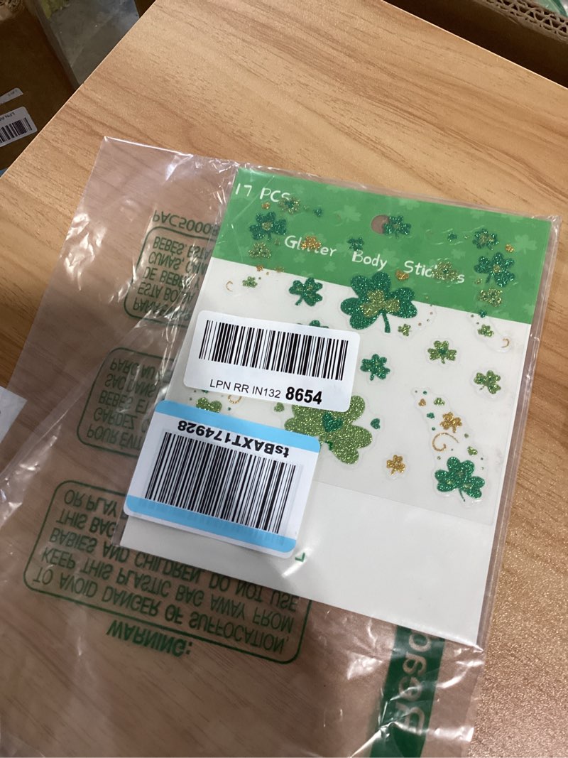 Condition photo showing New/Like New for shamrock glitter face tattoo body jewelry - 7.5" x 6" (pack of 1) - st. patrick's day celebration face gems with assorted non-toxic designs - sparkle in parades, parties & more