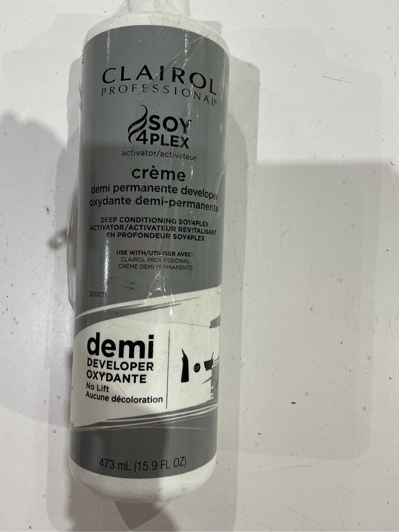 Condition photo showing As Is for store clairol professional crème demi permanent hair developer,