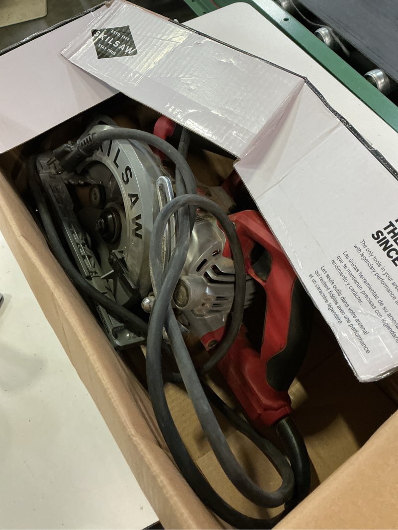 Condition photo showing As Is for skil 15 amps 7-1/4 in. corded worm drive circular saw tool only