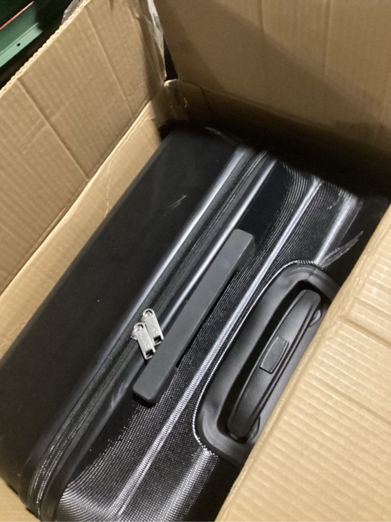 Condition photo showing As Is for Amazon Basics 30" Hardside Large Checked Luggage, Hardshell Suitcase With Wheels, Expandable For Up to 15% More Space, With Scratch-Resistant Surface, Four Multi-directional Wheels, Black Black Large Checked