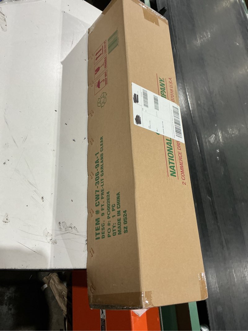 Condition photo showing New/Like New for national tree company 9 ft pre-lit crestwood spruce artificial christmas garland, christmas decoration with glitter, pinecones, red berries, 50 clear lights, 180 tips, green plug in tree