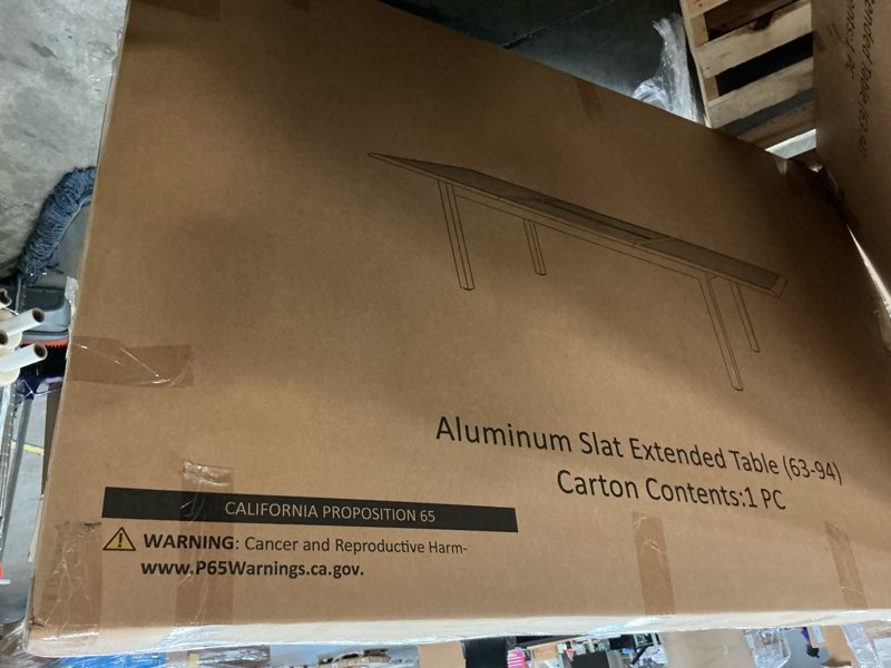 Condition photo showing New/Like New for aluminum slat extended table (63-94) fta01230q