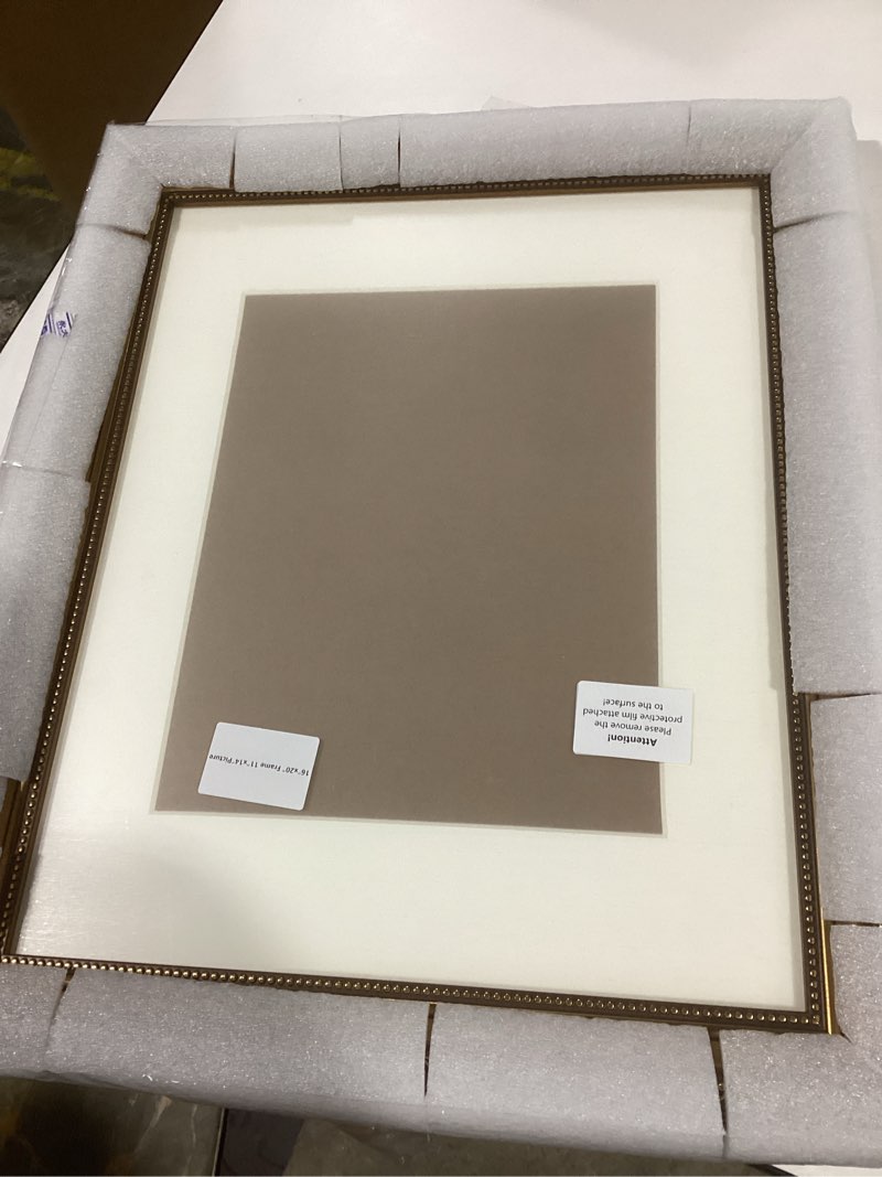 Condition photo showing Good Condition for ArtXO 16x20 Picture Frames with Mat: Bronze Frame for Display Pictures 20x16 without Mat or 11x14 with Mat, Wall Frames for Poster Canvas Prints 16x20 Frame Matted to 11x14 Bronze-p4k