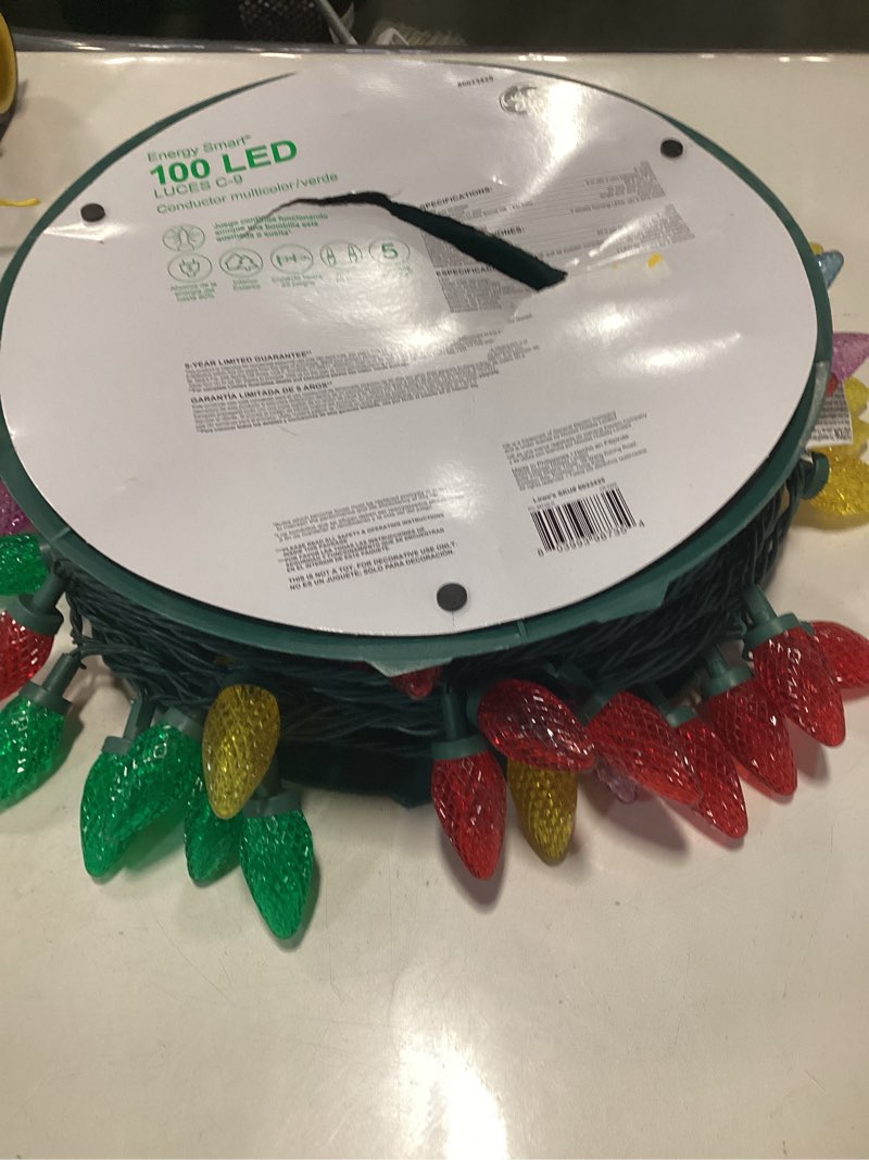 Condition photo showing As Is for Dazzle Bright C9 Christmas String Lights, 100 LED 66 FT Waterproof Connectable Green Wire Fairy Lights, Christmas Lights for Indoor Outdoor Home Yard Xmas Tree House Decorations (Multi-Colored) Multicolor 100 LED