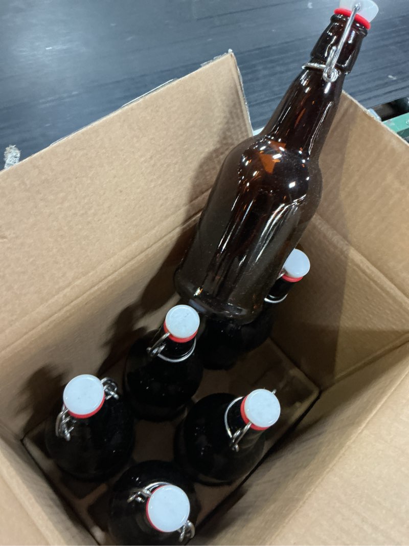 Condition photo showing Good Condition for flip top glass bottles 6 pack,16 oz amber swing top beer bottles with airtight lids, home brewing beer, wine, reusable leak-proof brewing bottle