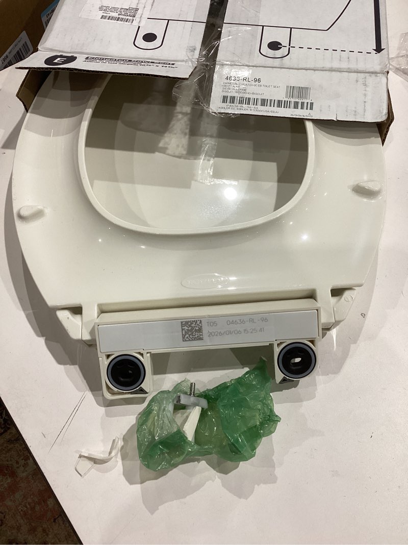Condition photo showing As Is for kohler 4636-rl-96 cachet readylatch elongated toilet seat slow close soft close, toilet seat quiet lid, contoured grip-tight bumpers installation hardware, apartment essentials, biscuit biscuit elongated ready latch