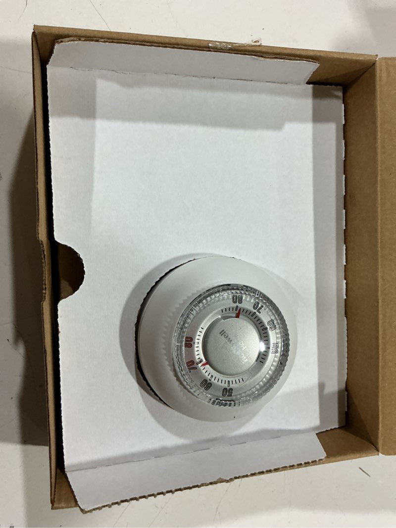 Condition photo showing Good Condition for honeywell home round non-programmable thermostat with 1h/1c single stage heating and cooling