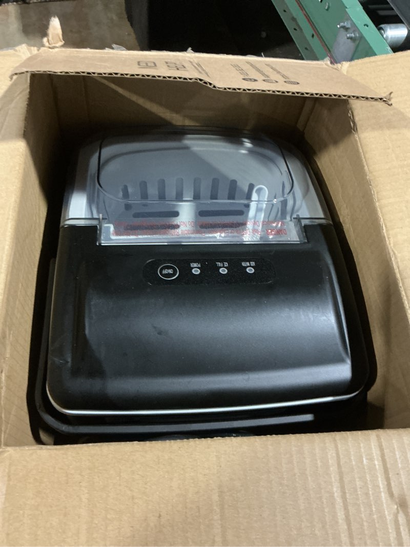 Condition photo showing As Is for EUHOMY Countertop Ice Maker Machine with Handle, 26lbs in 24Hrs, 9 Ice Cubes Ready in 6 Mins, Auto-Cleaning Portable Ice Maker with Basket and Scoop, for Home/Kitchen/Camping/RV. (Black) Black 26lbs