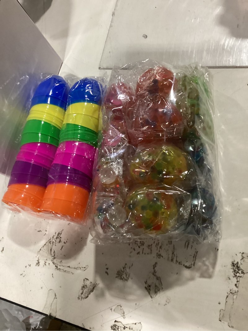 Condition photo showing New/Like New for 12 pack easter egg fillers with 12 light up egg shaped fidget stress balls, squeeze stress relief toys filled easter eggs hunts party favors, easter basket stuffers for kids toddler teens boys girls style 1