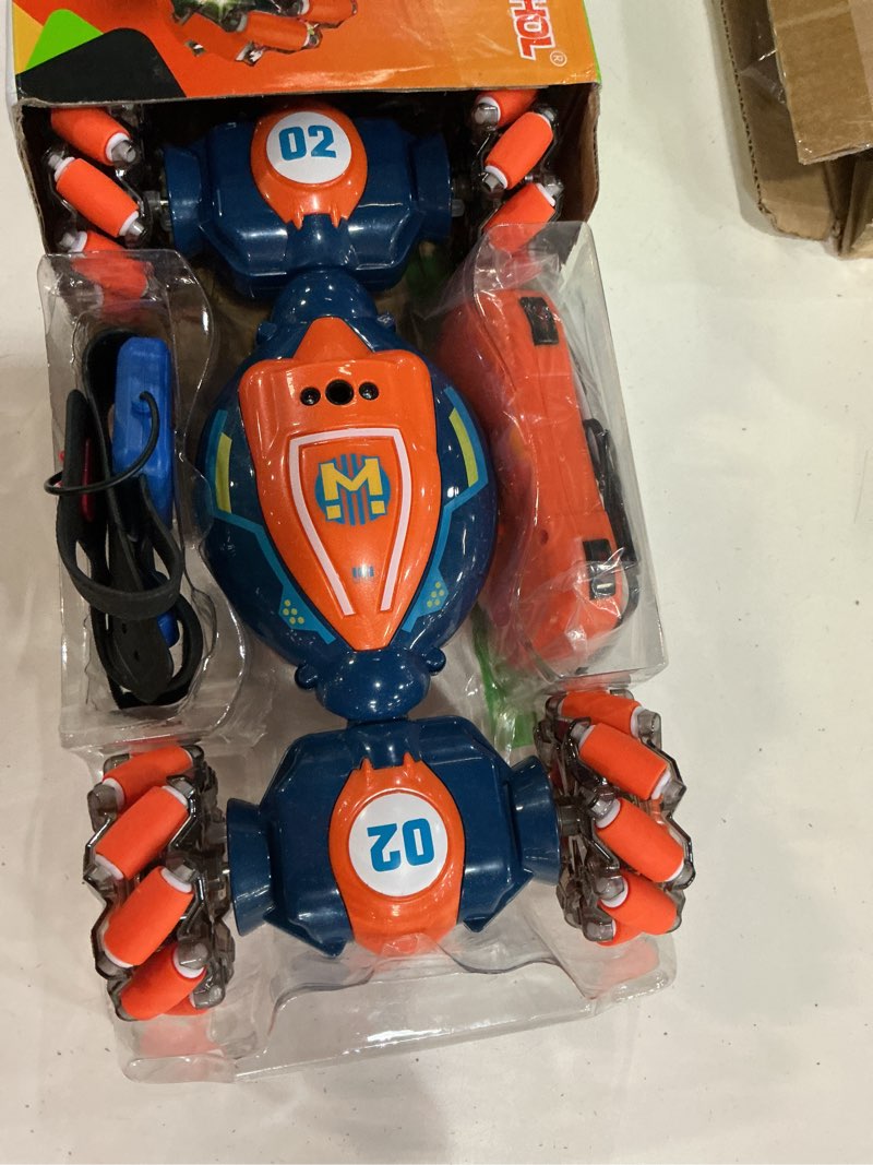 Condition photo showing New/Like New for gesture sensing rc stunt car - boys girls toys age 6-8-12, 4wd hand controlled remote control twist car with light & music,cool birthday presents and ideas gifts for kids age 6 7 8 9 10 11 12 yearsold blue orange