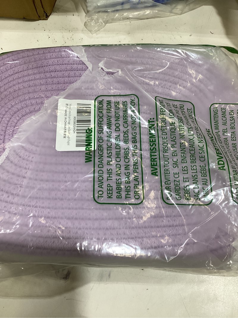 Condition photo showing New/Like New for Woven Cotton Rope Storage Basket with Handles for Organizing Shelves Closet Small Cat Dog Pet Toy Baskets Box Bin Decorative Rectangle Baby Nursery basket Gift basket Empty(light purple)