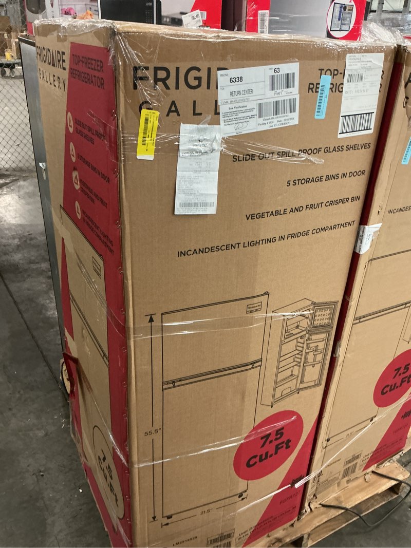 Condition photo showing As Is for 7.5 cu. ft. mini refrigerator with top freezer in stainless look