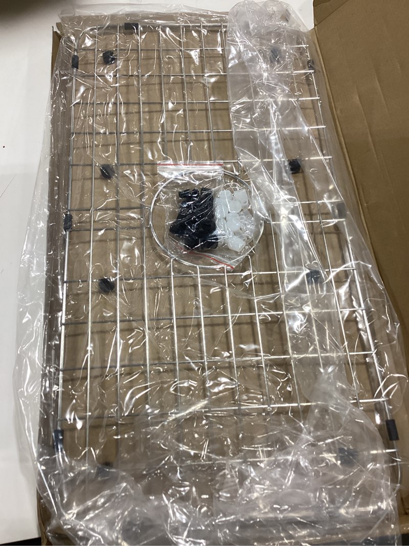 Condition photo showing Good Condition for serene valley 25-1/8" x 12-7/8" sink grid, centered drain with corner radius 1-1/2", nlw2513c