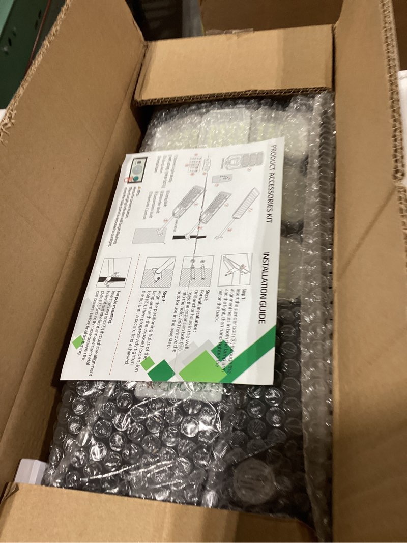 Condition photo showing New/Like New for Solar Lights Outdoor-6500K 1200W Led Street Light, IP66 Waterproof Solar Street Lights Outdoor with Motion Sensor & Dusk to Dawn, led solared Street Light Easy Installation,Pack of 2 Black 1200W-2Pack