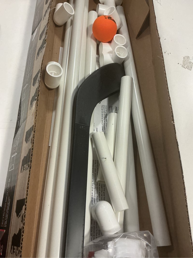 Condition photo showing New/Like New for Mylec MINI Hockey Set - 1 x MINI PVC Hockey Goal (30.5" x 23"), 2 x Plastic MINI Player Sticks (Left and Right), 1 x Hockey Foam Ball, Lightweight, Sleeve Netting System (Red, 3 Pounds)