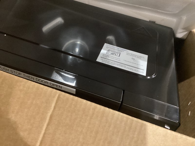 Condition photo showing Good Condition for Farberware 1.1 Cu. Ft. Countertop Microwave Oven – 1000 Watts Power, Auto Cook Settings, Defrost, Easy Clean and Child Safety Lock - Stainless 1.1 Cu. Ft. Stainless Steel