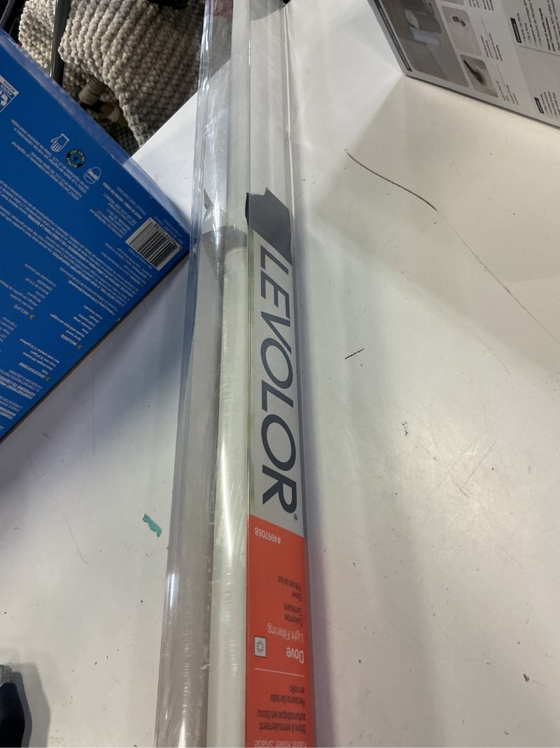 Condition photo showing As Is for levolor 37-in x 72-in dove light filtering cordless roller shade