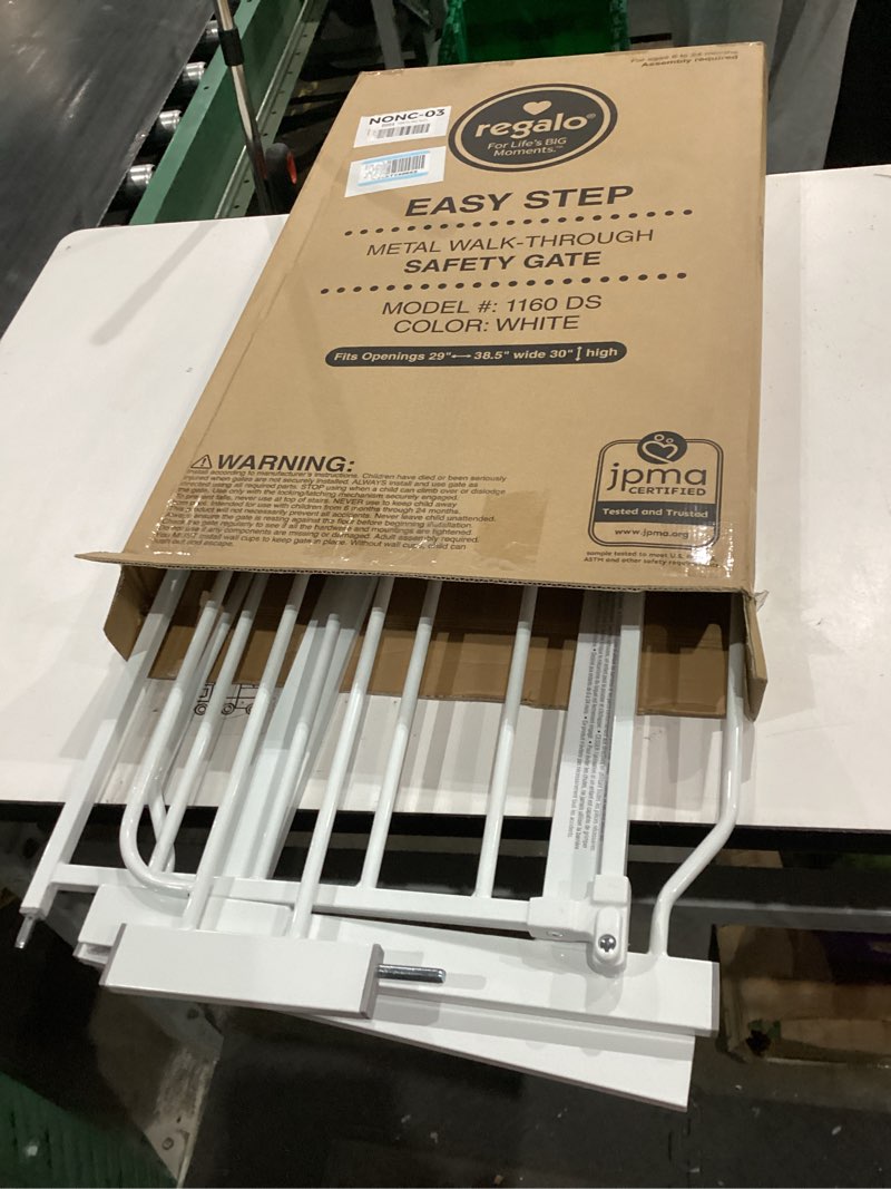 Condition photo showing As Is for regalo safety 38" baby gate for doorways & bottom of stairs, pressure mount design for babies, toddlers & pets, tested & safe for 30 years, american designed, american owned, white white 29-38.5"w x 30"h