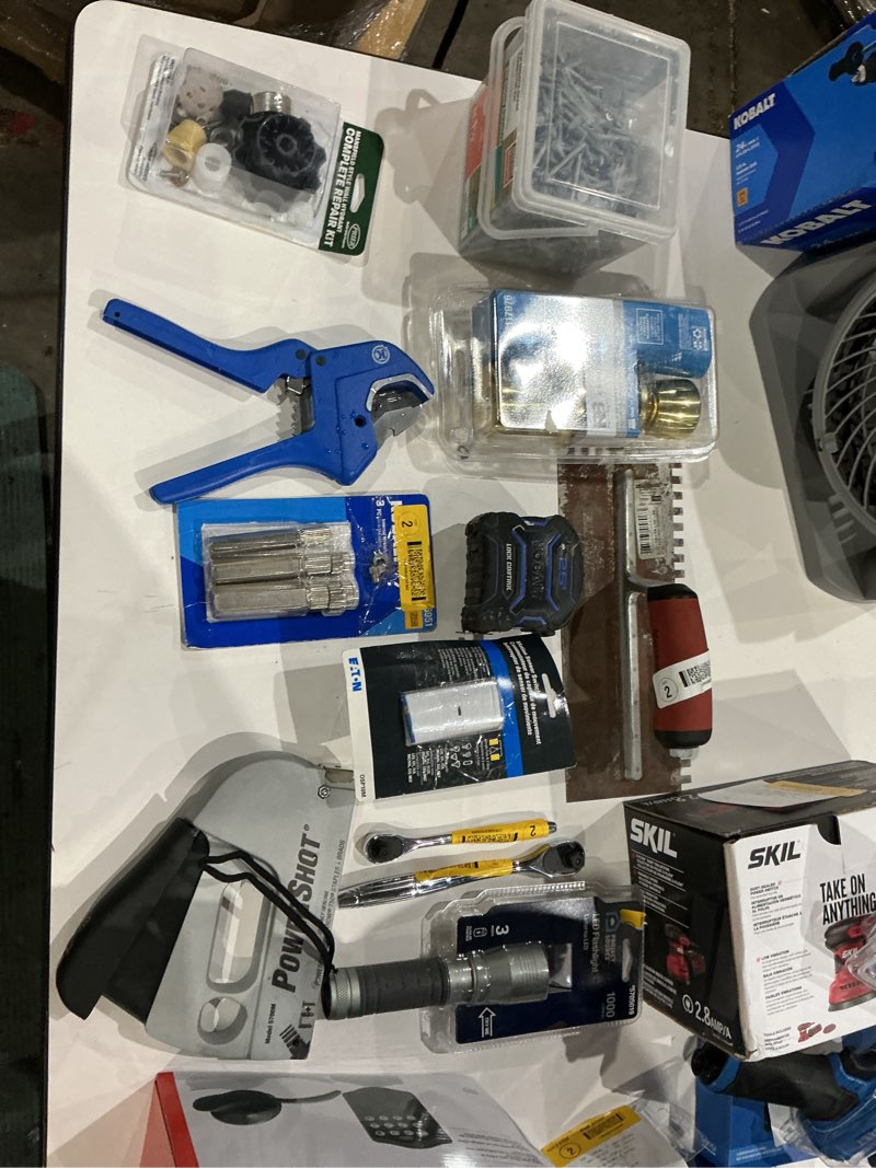 Condition photo showing As Is for assorted home improvement lot (small tools, screw, home accessories, etc.)