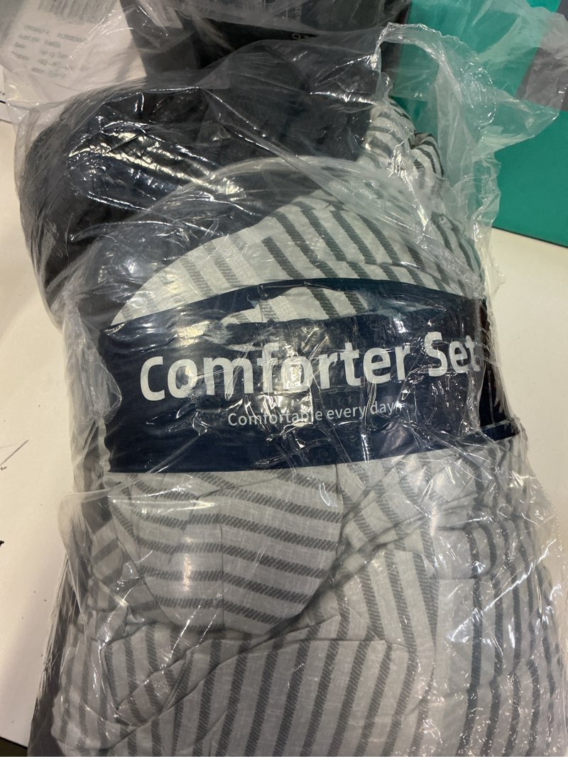 Condition photo showing New/Like New for wongs bedding black comforter set queen, reversible black grey stripe down alternative comforter for all season,3 pieces(1 patchwork comforter+2 pillowcases), soft microfiber bedding set 90"×90" queen black