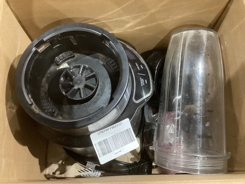 Condition photo showing As Is for Ninja | Blender | Nutri Pro | Single Serve | For Smoothies, Salsa, Shakes and Frozen Drinks | Includes 2 Smoothie Cups & Lids | Crushes Ice, Fruit & Veggies |Silver | BN401 Auto Blend 1000-Peak-Watts