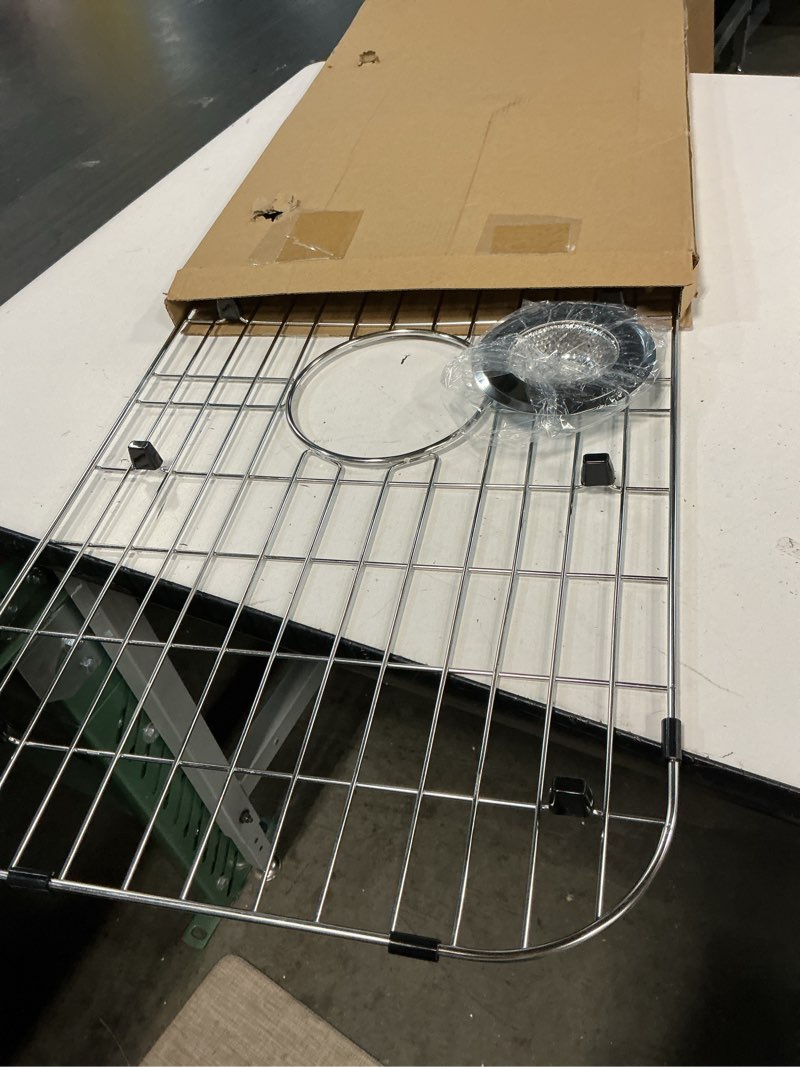 Condition photo showing Good Condition for ipegtop sink bottom grid 28"x 15", stainless steel sink protector centered drain with round corner radius, sink grate for bottom of kitchen single sink bowl with hole, one-piece 28"x 15",centered drain