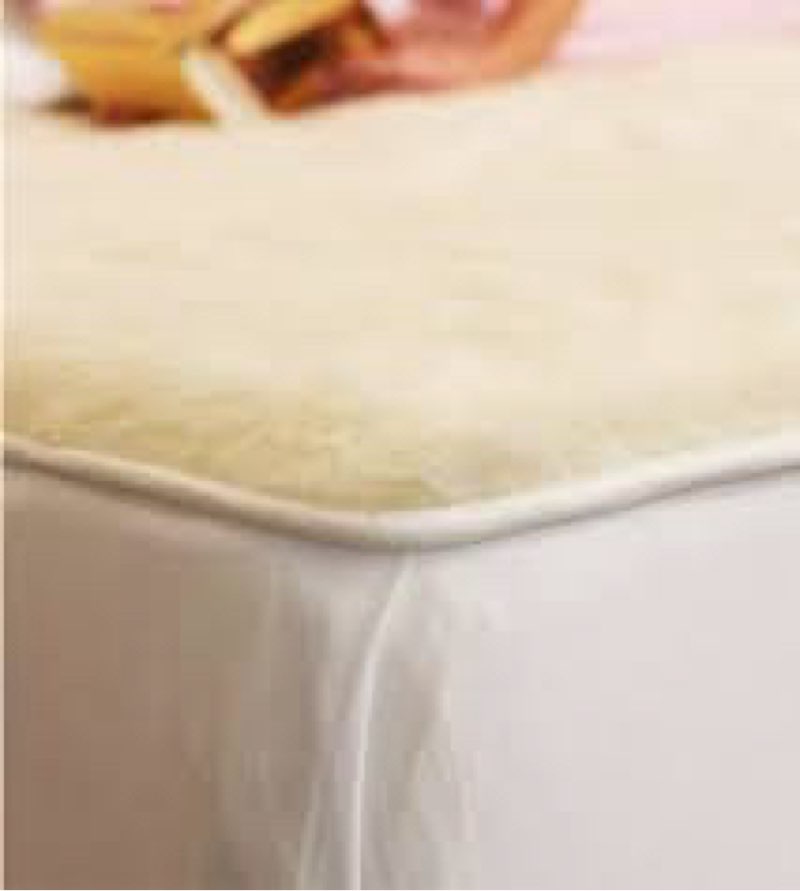 Cream colored mattress topper