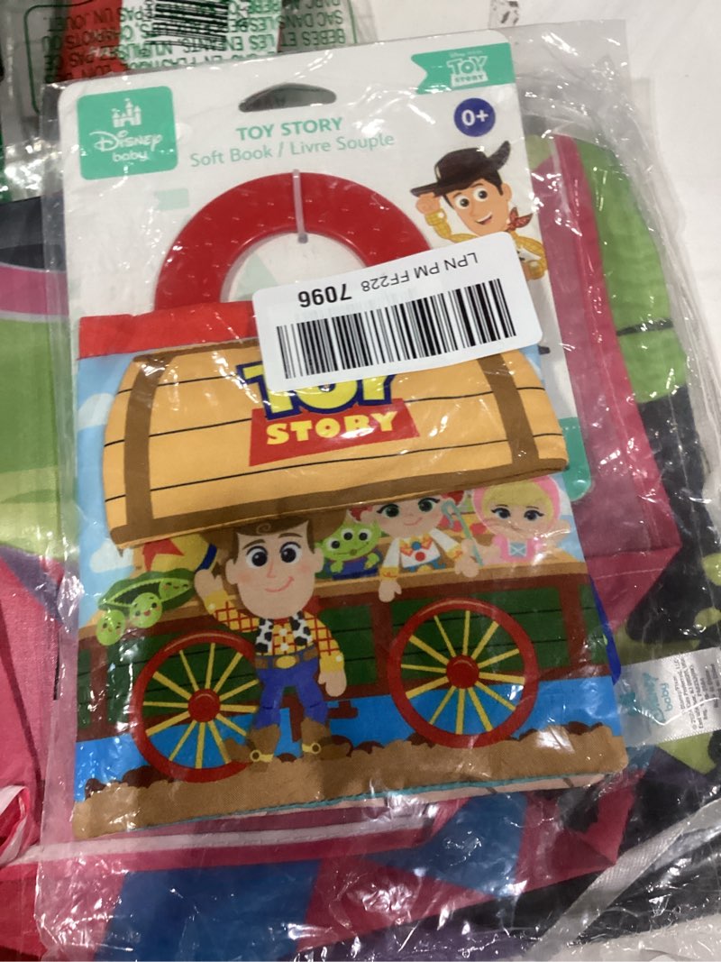 Condition photo showing New/Like New for disney baby pixar toy story toy box soft book