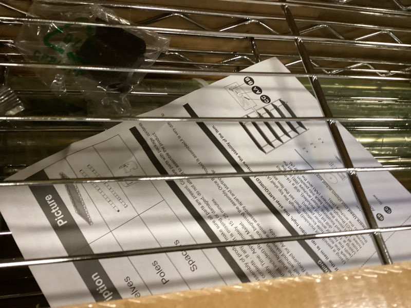 Condition photo showing Good Condition for IZEUK 4-Tier Adjustable Heavy Duty Metal Wire Shelving Unit, Wide Storage Rack Organizer for Garage, Kitchen, Office, Dorm, Warehouse (Silver, 15.8" D x 45.8" W x 59.4" H, 1400 lbs Capacity) 4 Tier,15.8" D x 45.8" W x 59.4" H Chrome