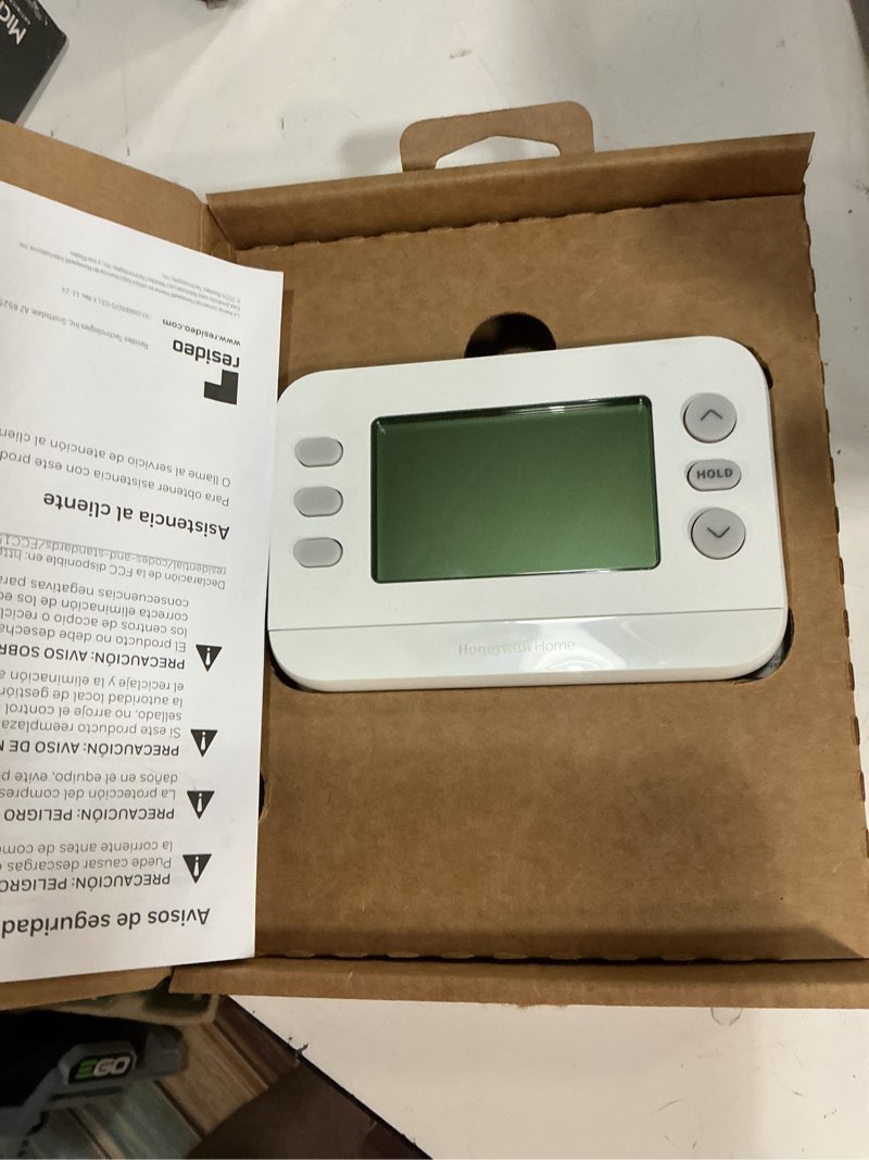 Condition photo showing New/Like New for honeywell home x2p heating and cooling push button programmable thermostat