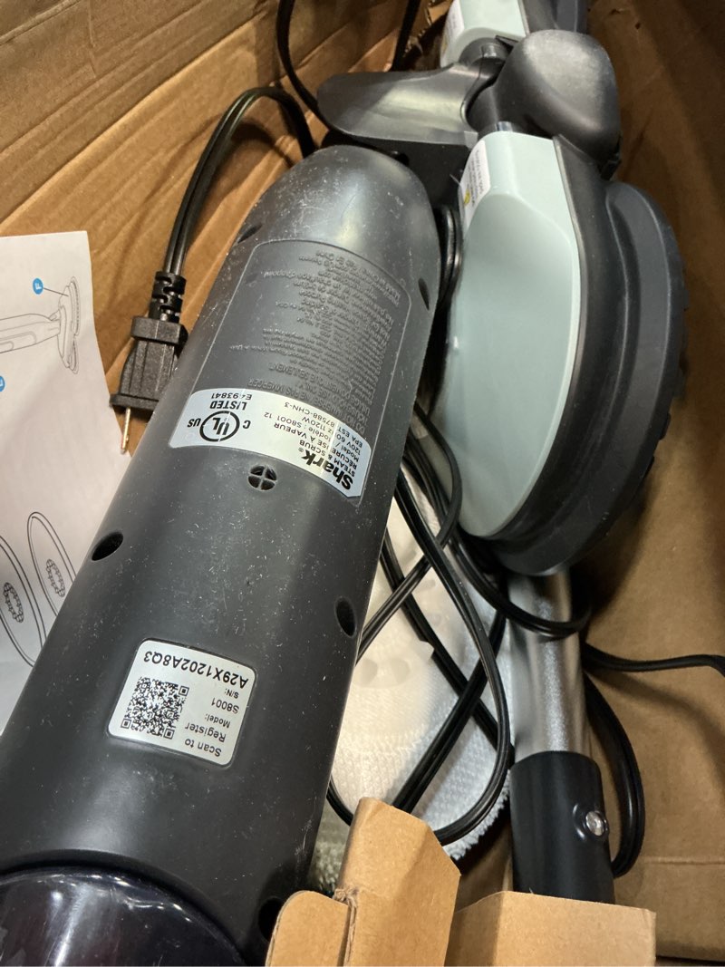Condition photo showing As Is for shark steam & scrub steam mop, all-in-one scrubbing and sanitizing hard floor cleaner, led headlights, 4 dirt grip soft scrub pads included, xl water tank, swivel steering, hawaiian grey, s8001