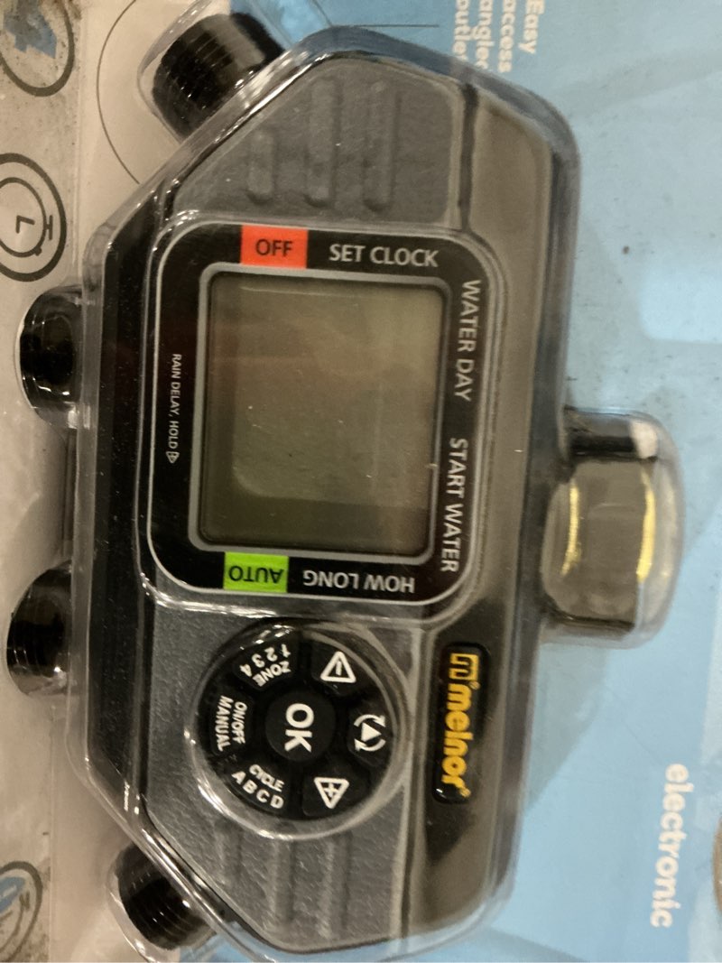 Condition photo showing As Is for melnor hydrologic programmable 4 zone digital water timer