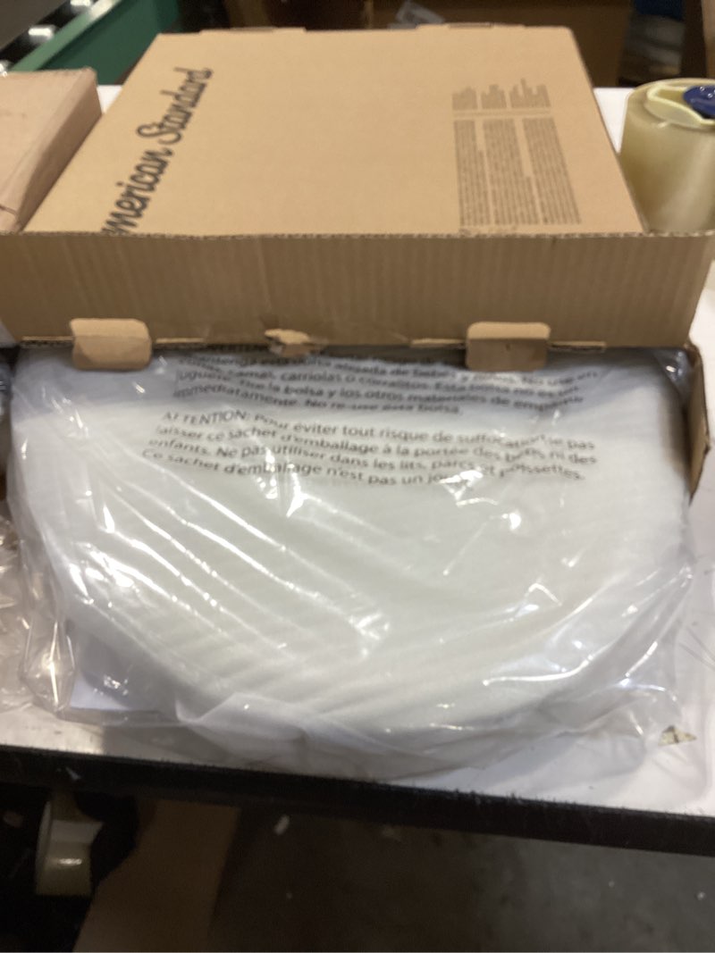 Condition photo showing Good Condition for american standard 5257a65mt.222 cardiff slow-close elongated front toilet seat, linen linen modern