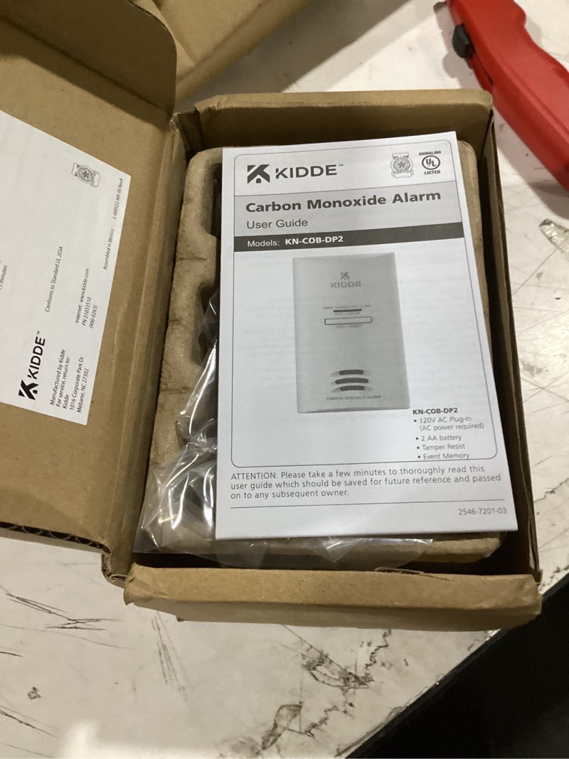 Condition photo showing As Is for kidde carbon monoxide detector, plug-in carbon monoxide detector with aa battery backup, 85 db alarm, led status light indicators, 3rd edition 1 pack 3rd edition