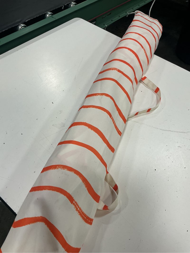 Condition photo showing New/Like New for 6' round outdoor patio striped beach umbrella orange - room essentials ?