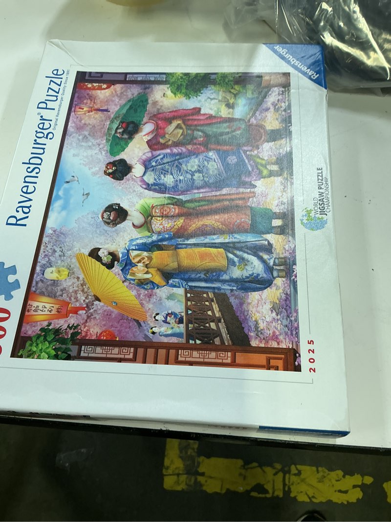 Condition photo showing New/Like New for ravensburger blossom walk 500 piece jigsaw puzzle – peaceful garden path challenge, relaxing fun for adults & families