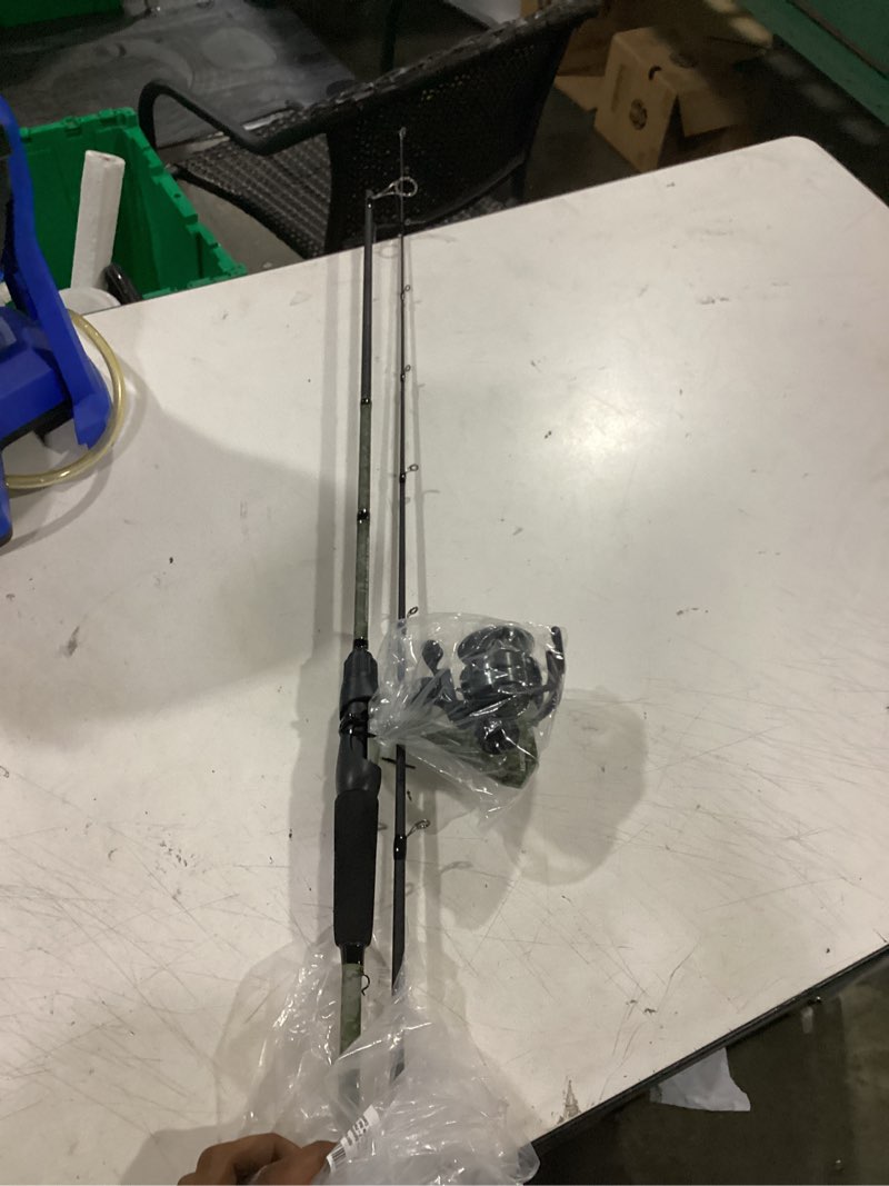 Condition photo showing Good Condition for lew’s american hero camo spinning reel and fishing rod combo, im7 graphite rod, interchangeable retrieve, camo/black
