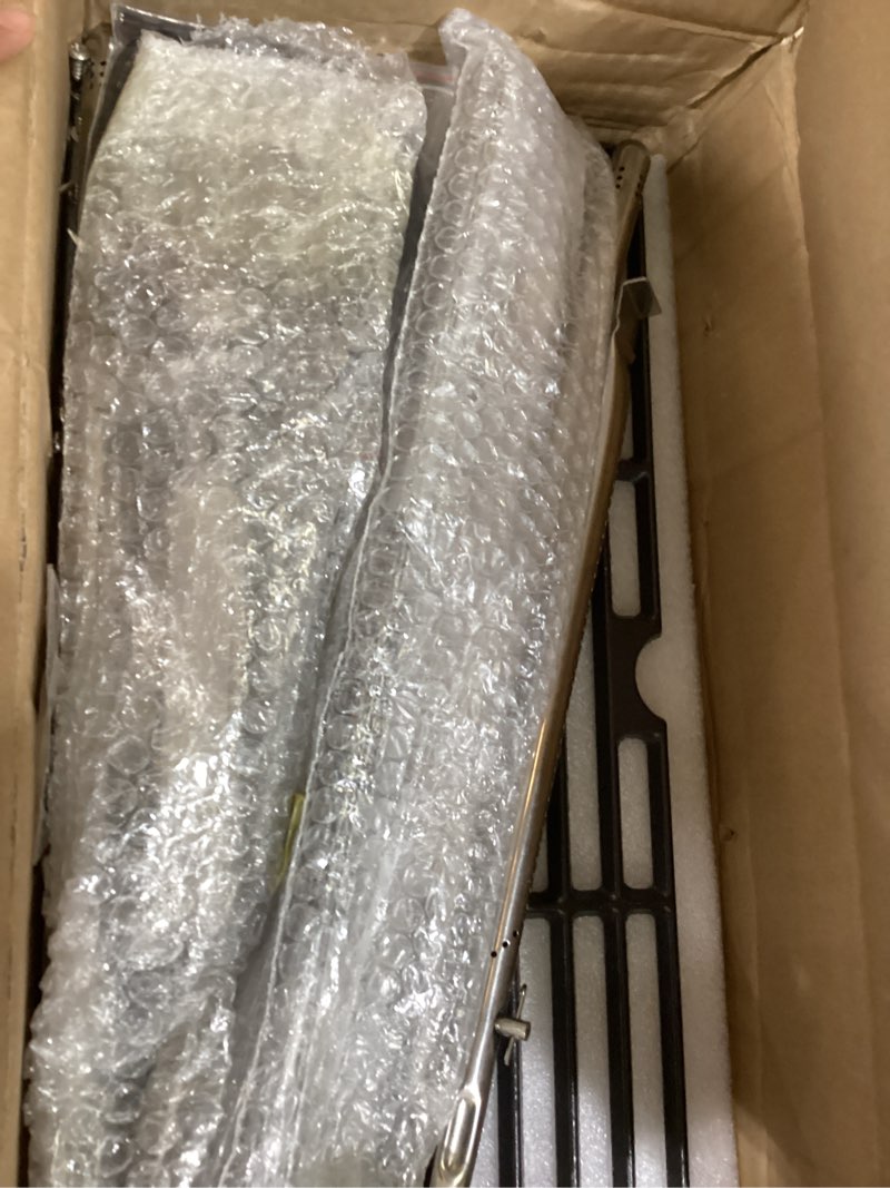 Condition photo showing Good Condition for grill grates replacement parts for charbroil advantage 463344116, 16 15/16'' cast iron grill grates, stainless steel burner tubes, heat plates shields, adjustable carryover tubes and igniters. 4 burner - 15 1/2" heat plate