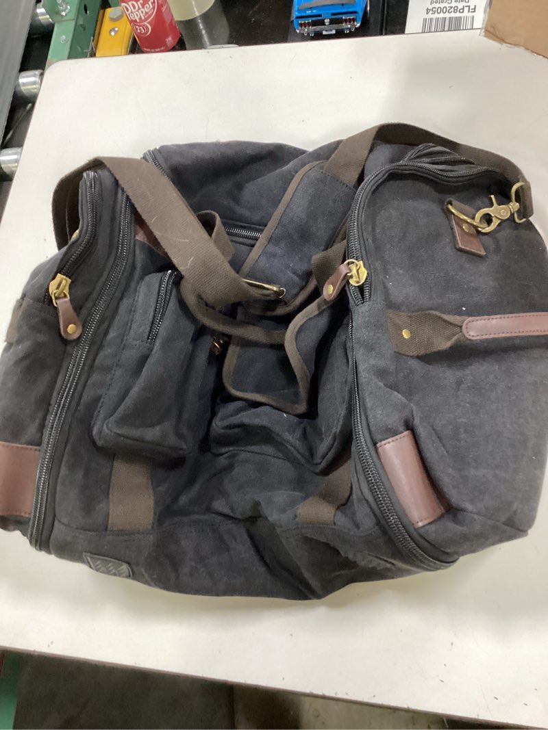 Condition photo showing As Is for duffle bag for travel, 50l carry on duffle bag for airplanes, canvas overnight weekender bag for men and women black