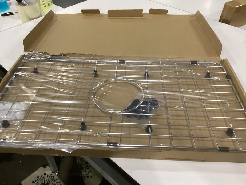 Condition photo showing Good Condition for serene valley sink bottom grid 24-1/8" x 12-5/8", centered drain with corner radius 1-1/2", sink protector nlw2412c