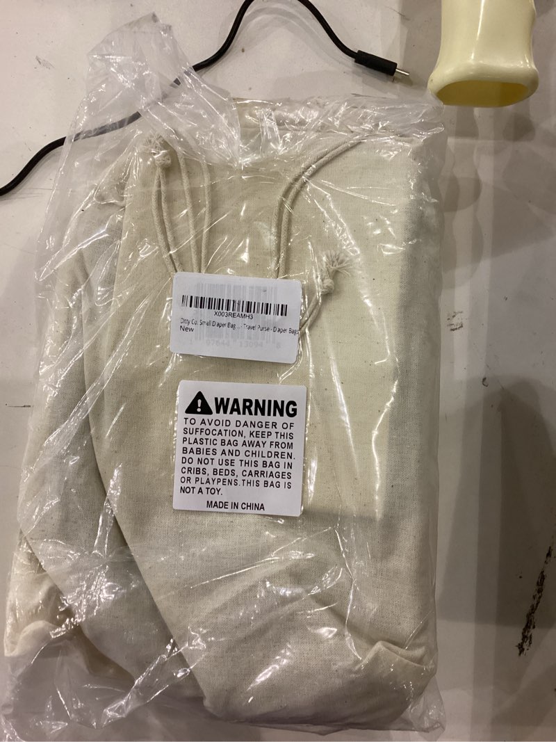 Condition photo showing Good Condition for Ditty Co. Small Diaper Bag - Portable Changing Pad - Crossbody Bags For Women - Baby Wipe Holder - Baby Travel Essentials (True Black)