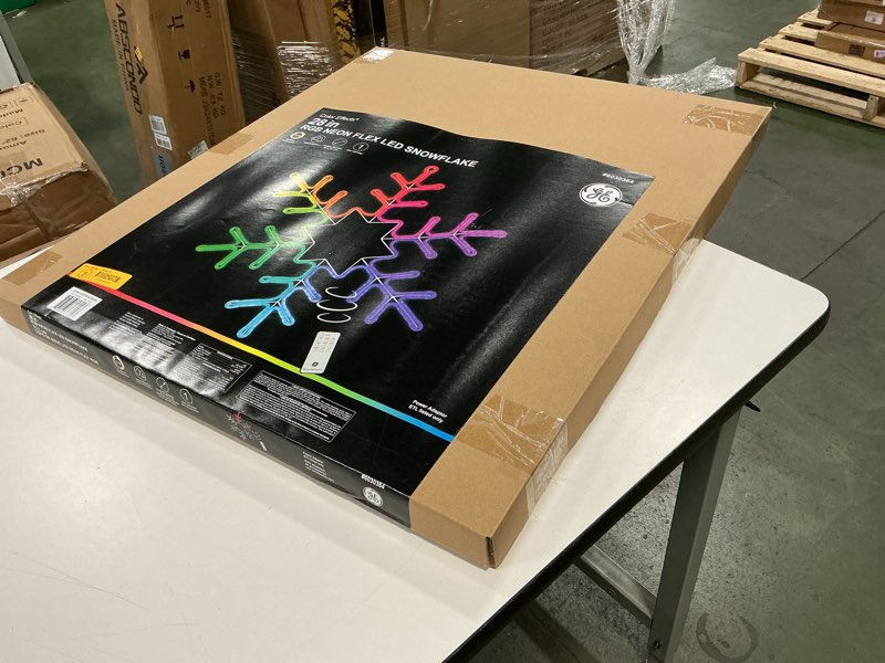 Condition photo showing As Is for GE 28-in Hanging Snowflake Ornament with Multicolor LED Lights