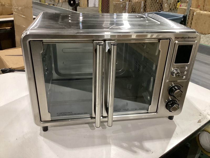 Condition photo showing New/Like New for hamilton beach sure crisp 6-in-1 xl digital air fryer toaster oven combo, with easy-access french doors, bake, broil, toast, pizza & reheat functions, 0.9 cu. ft. capacity, stainless steel (31191)