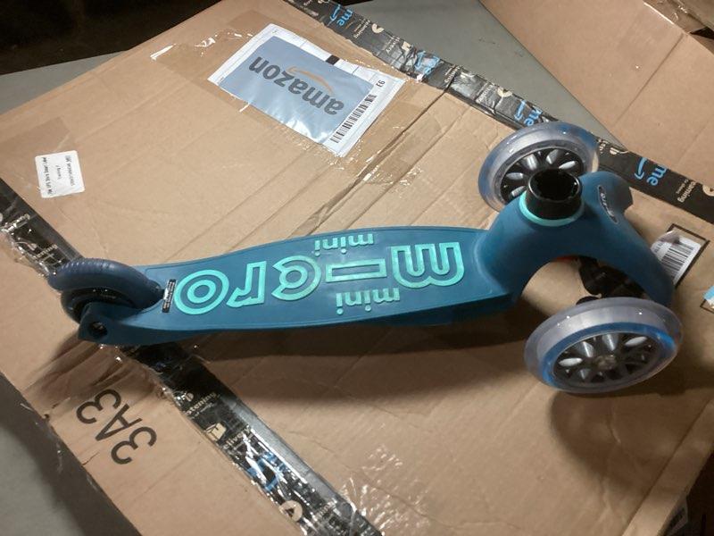 Condition photo showing As Is for micro kickboard | mini kids scooter for ages 2-5 | children up to 110 lbs | 3 wheel lean-to-steer design | adjustable t bar | smooth ride pu wheels | swiss design ice blue