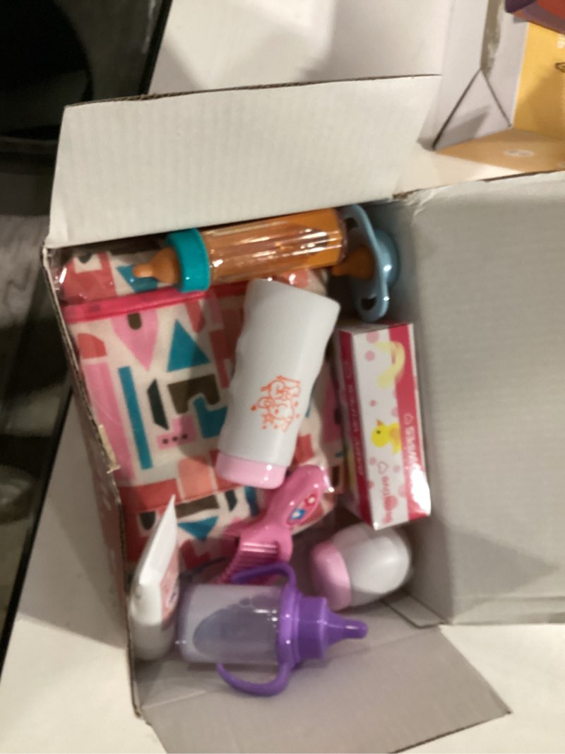 Condition photo showing Good Condition for 14 pack baby doll accessories, baby doll feeding and caring set includes diaper bag, doll diapers, magic bottle, changing mat for girl toddler kid, babies pretend play set for birthday gift christmas