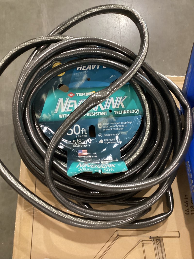 Condition photo showing As Is for neverkink teknor apex 5/8-in x 50-ft heavy kink free vinyl gray coiled hose
