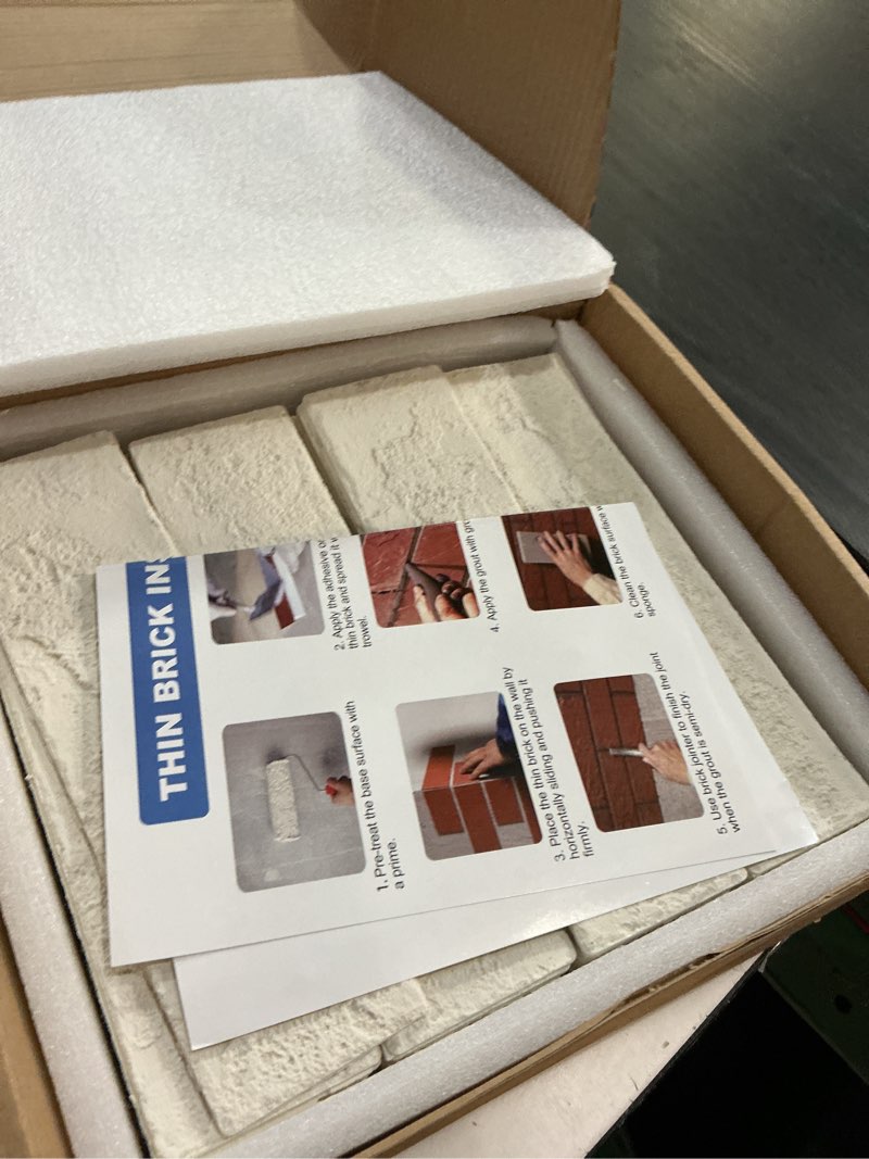Condition photo showing Good Condition for 100 old town white faux brick wall tiles, 3d thin brick veneers for bedroom, bathroom, kitchen, fireplace and fence wall panels (14.2 sq ft) 100 pieces, 8.66"x2.36"x0.15" white