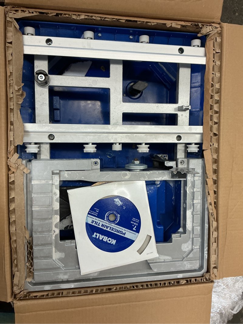 Condition photo showing As Is for kobalt 6-amp 7-in-blade corded wet tabletop sliding table tile saw